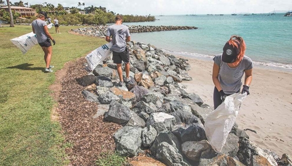 Image forMY Dragonfly crew help with Whitsunday beach clean up